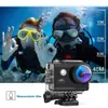 Two divers giving a thumbs up underwater, with an action camera in the foreground. Produktbild-Vorschau