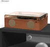 A retro-style music player with a wooden finish and a transparent lid, placed on a dark shelf. Náhled obrázku produktu