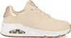 A side view of a single Skechers Uno Golden Air women's sneaker in beige. Anteprima dell’immagine prodotto
