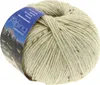 A ball of cream-colored yarn with brown flecks, with a label showing a mountain landscape and brand name. Produktbild-Vorschau
