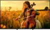 A woman playing a cello in a field of tall grass during sunset. Voir les images du produit