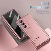 A rose gold phone case with a stand and pen holder is shown on a pink and gray background. Anteprima dell’immagine prodotto