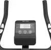 Close-up of the digital display and handlebars of a stationary exercise bike. Náhľad obrázku produktu