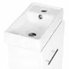 A white bathroom vanity with a sink and faucet. Produktbild-Vorschau