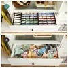 Two drawers are shown side by side. The top drawer is neatly organized with folded undergarments in various colors, separated into compartments. The bottom drawer is messy, with undergarments piled loosely. Produktbild-Vorschau