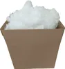 A cardboard box filled with white fluffy material. Produktbild-Vorschau