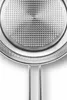 A close-up view of the interior of a metal frying pan with a honeycomb pattern. Podgląd zdjęcia produktu