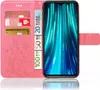 A pink flip case for a smartphone, showing credit cards and euro banknotes inserted into the case. Produktbild-Vorschau
