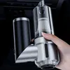 A hand holding a portable car vacuum cleaner in a car. Produktbild-Vorschau