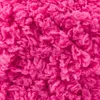 A close-up, textured view of bright pink yarn. Anteprima dell’immagine prodotto