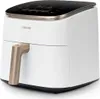 A white Cosori air fryer with a gold handle and a black digital display. Náhľad obrázku produktu