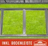 A close-up view of a metal garden shed frame with a green grassy background, and text overlay at the bottom. Produktbild-Vorschau