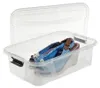 A clear plastic storage box with a lid, containing a pair of wedge sandals. Produktbild-Vorschau
