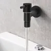 A black wall-mounted faucet with water flowing into a white bathtub. Podgląd zdjęcia produktu