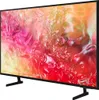 A Samsung smart LED TV with a colorful abstract image displayed on its screen, shown from a side angle with its stand. Produktbild-Vorschau