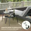 A set of two nesting coffee tables on a patio with a lounge chair and decorative items. Anteprima dell’immagine prodotto