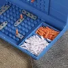 A close-up view of a blue game board with game pieces and markers. Produktbild-Vorschau