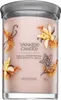 A Yankee Candle jar with a lid. Voir les images du produit