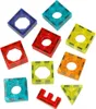 A collection of colorful magnetic building blocks, including squares, diamonds, and a triangle, arranged on a white background. Náhled obrázku produktu