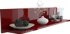 A red high-gloss shelf with decorative items. Produktbild-Vorschau