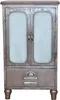 A metal cabinet with two glass doors and a drawer, standing on four legs. Produktbild-Vorschau