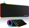 A gaming mousepad with RGB lighting is shown, both flat and rolled up. Produktbild-Vorschau