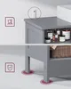 A split image showing a gray bathroom vanity with storage shelves and items on them. Produktbild-Vorschau