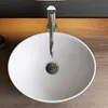 A top-down view of a white ceramic sink with a chrome faucet. Produktbild-Vorschau