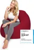 A woman is sitting on a red beanbag chair. Produktbild-Vorschau