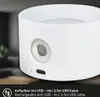 Close-up of a white rechargeable lamp with a USB-C port and a metallic accent. Anteprima dell’immagine prodotto