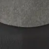 A close-up view of two different textured materials, one gray and ribbed, the other black and crinkled, meeting at a curved seam. Náhled obrázku produktu