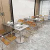 Interior of a cafe or restaurant with tables and chairs. Anteprima dell’immagine prodotto