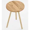 A round wooden side table with three legs on a white background. Produktbild-Vorschau