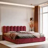 A plush red upholstered bed is shown in a well-lit bedroom setting, with a large window and soft curtains. Anteprima dell’immagine prodotto