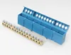 A brass terminal block with multiple screw connectors and a blue plastic cover are shown on a white background. Produktbild-Vorschau