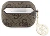 A brown and gold patterned AirPods Pro 2 case with a gold charm. Podgląd zdjęcia produktu