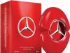 A red perfume bottle and its packaging are displayed against a white background. Voir les images du produit