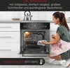 A woman is cleaning the inside of an oven. The oven is open and has racks inside. The oven has a digital display and control knobs. Produktbild-Vorschau
