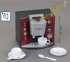 A toy Bosch coffee machine with cups and spoons, with musical notes indicating sound. Produktbild-Vorschau