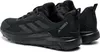 A pair of black Adidas Terrex outdoor hiking shoes shown from a rear-side angle. Produktbild-Vorschau