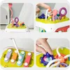 A collage of four close-up images showing different features of a multi-activity toy cube for babies and toddlers. Produktbild-Vorschau
