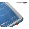 A close-up view of a blue paper cutter with silver metal accents and measurement markings. Voir les images du produit