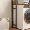 A laundry room scene with a washing machine and storage shelves. Náhled obrázku produktu