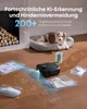 A robot vacuum cleaner is shown on a wooden floor, with various household items like slippers and socks highlighted in clear boxes around it. A dog is sleeping on a dog bed in the background, and a stack of firewood is visible to the left. Text overlays de Náhled obrázku produktu
