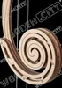 A close-up view of a wooden scrollwork detail, possibly from a musical instrument or decorative item, against a black background. Voir les images du produit