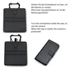 The image shows a black wallet-style phone case with a smartphone inserted, demonstrating how to use the camera and how the case protects it when closed. It also includes German and English text explaining this. Produktbild-Vorschau