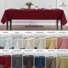 A collage of different colored tablecloths laid out on tables, with text indicating color selection. Produktbild-Vorschau