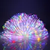 A coiled string of colorful LED lights against a dark background. Produktbild-Vorschau