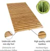 A bamboo bath mat is shown from a slightly elevated angle, with close-up insets highlighting its underside and material. Text describes its features. Produktbild-Vorschau