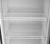Interior view of an empty refrigerator with two wire shelves. Produktbild-Vorschau